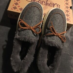 Skechers Gray and White Skechers shoes. Super comfy and cute!  So comfy!!